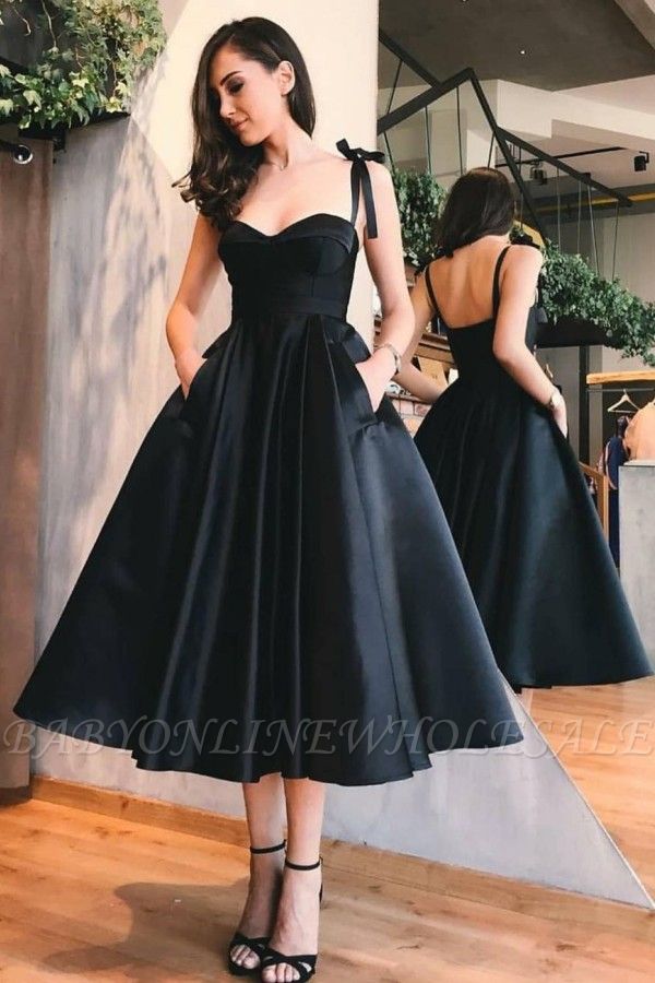 فستان حفلة أسود قصير بدون أكمام على شكل قلب مع جيوب