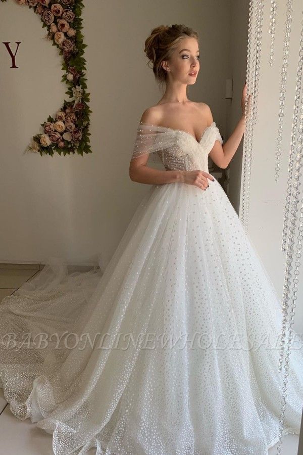 white gown with pearls