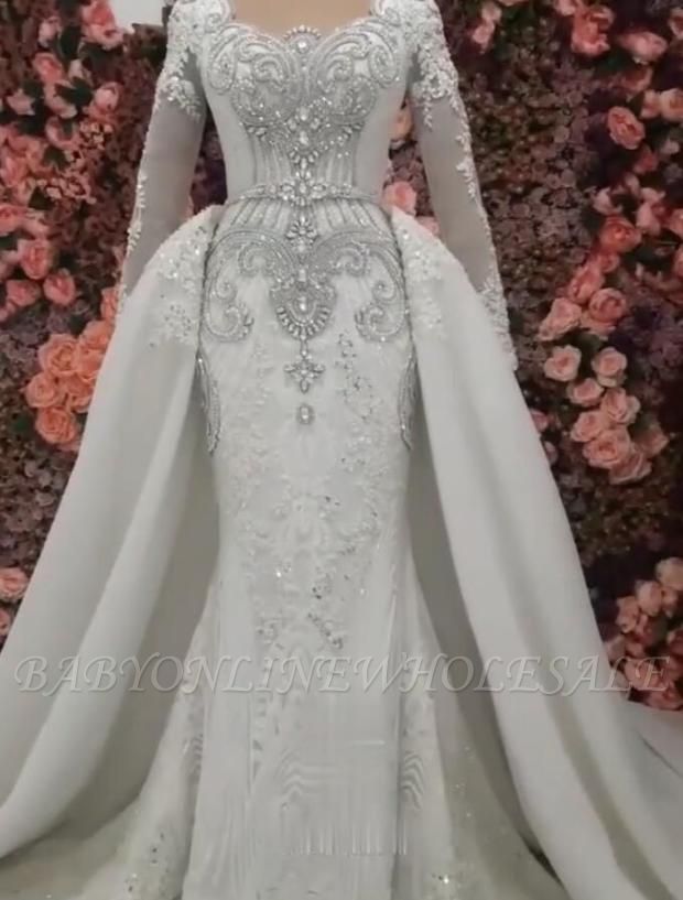 Элегантное свадебное платье с длинными рукавами и русалкой